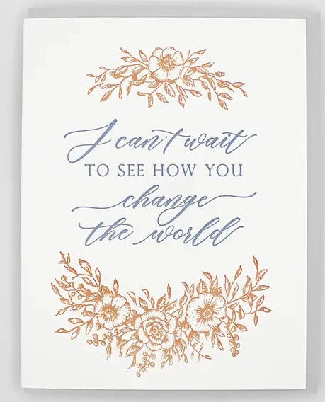 White greeting card with floral design and blue text