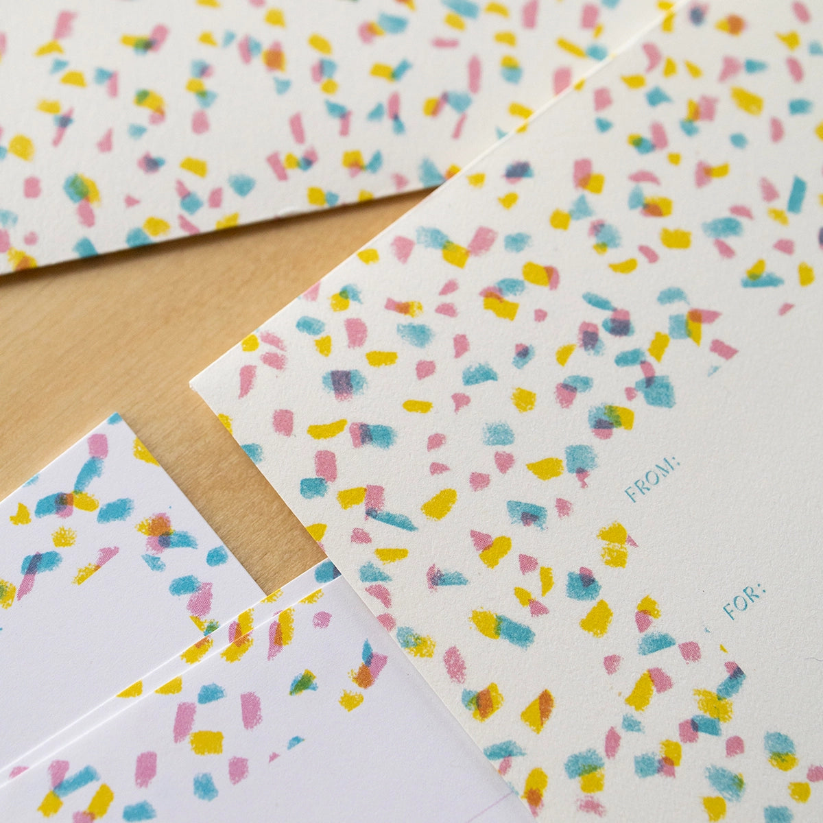 Colorful confetti-patterned envelopes