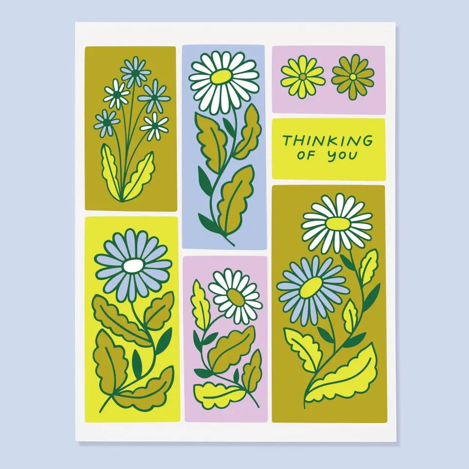 White card. Multicolor blue, pink, yellow, and green flower illustrations. "Thinking of you" in blue text.