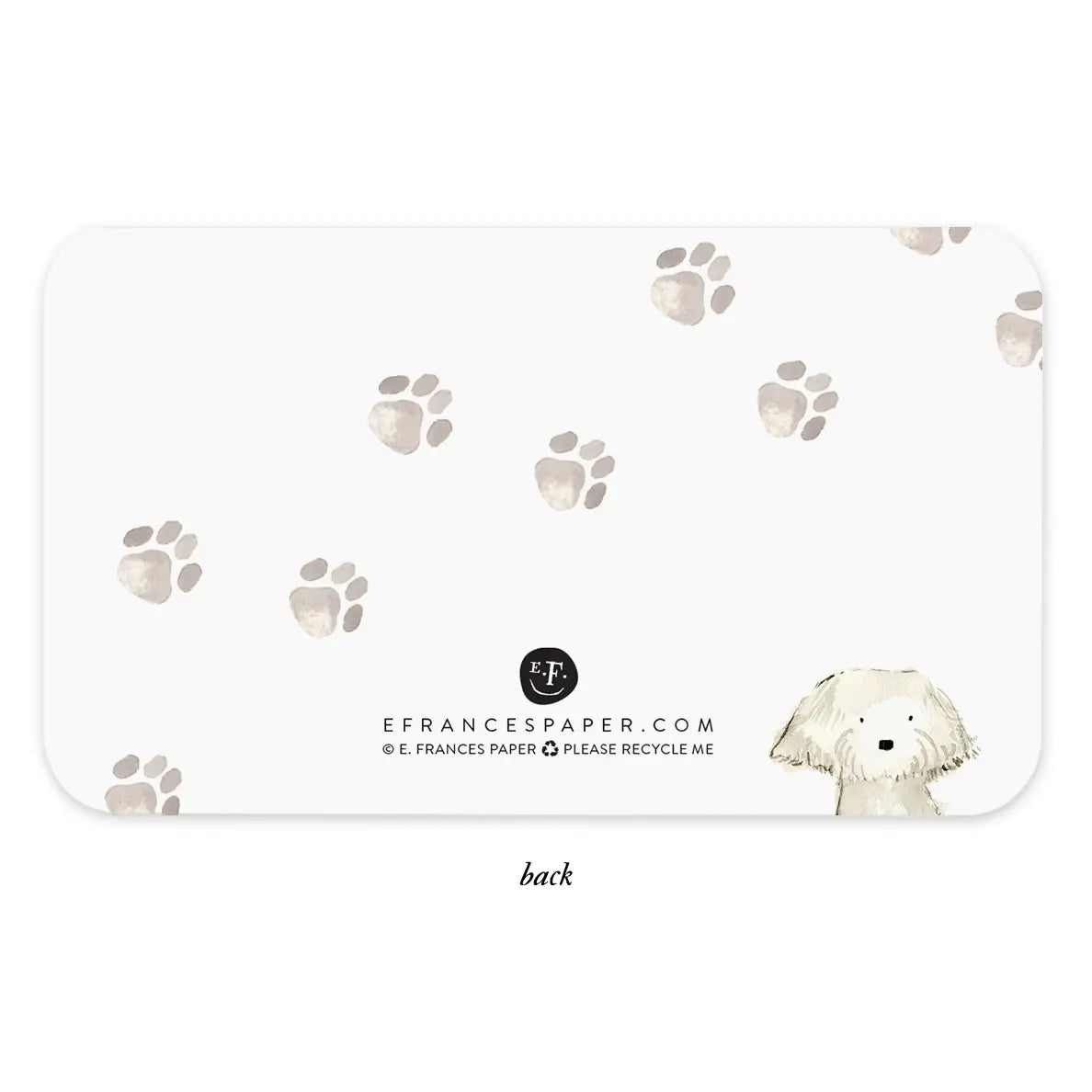 Back of a card with paw print pattern and dog illustration