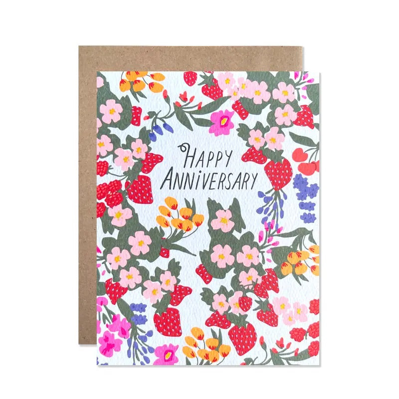 White card with red, orange, pink, green, and blue fruits and floral illustration. "Happy anniversary" in black text