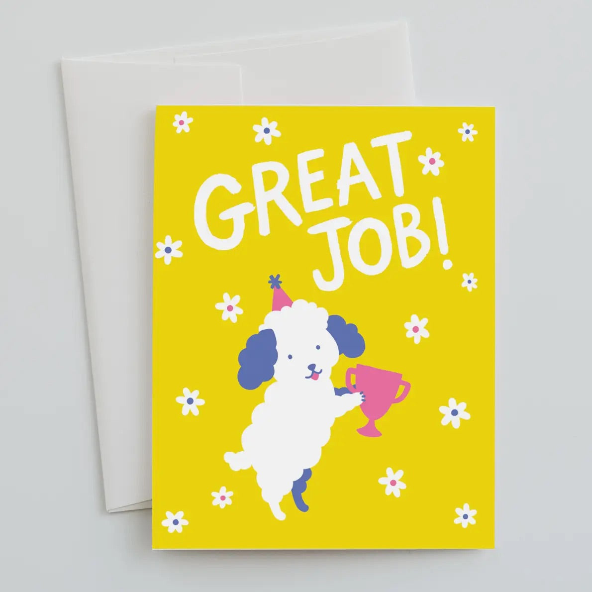 White greeting card with full color yellow background. Illustration of a dog holding a trophy. White text “great job!”
