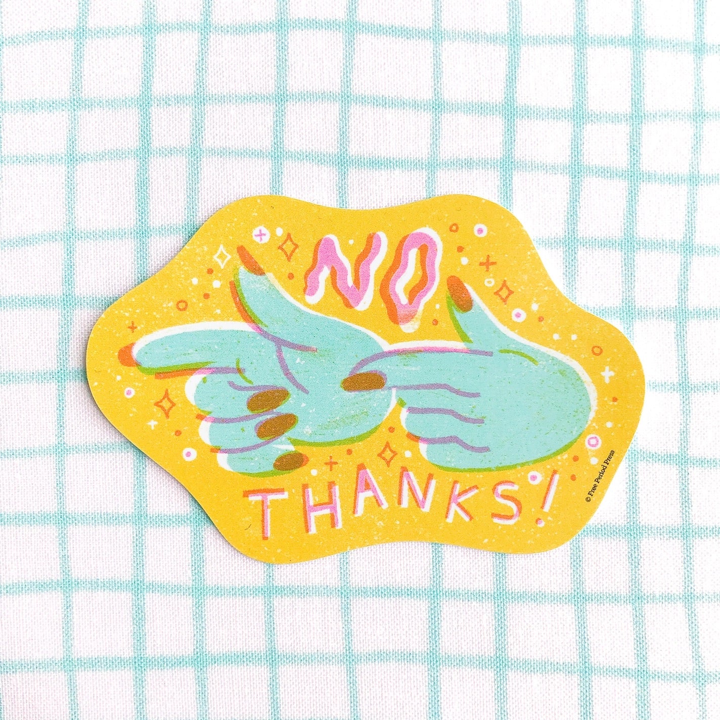 Die-cut sticker with yellow background. Illustration of two hands pointing. Pink text "no thanks!"