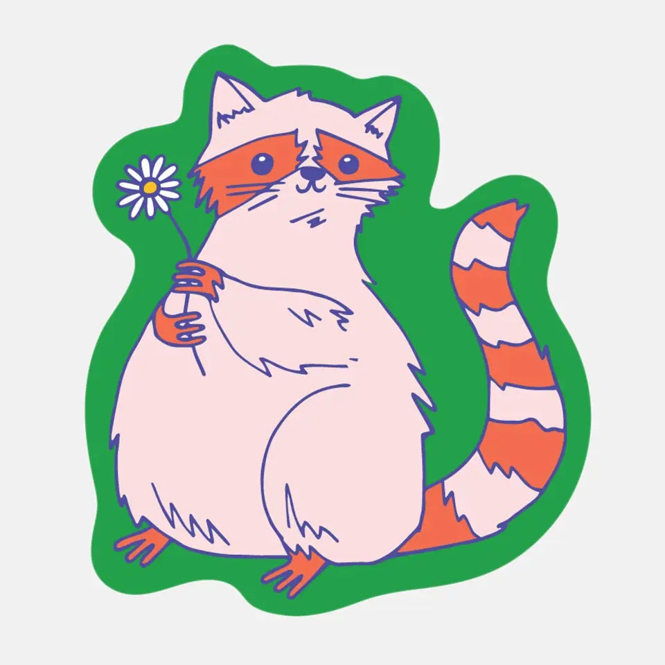 Die-cut sticker in the shape of a raccoon. Green background with illustrated pink and red raccoon holding a daisy.