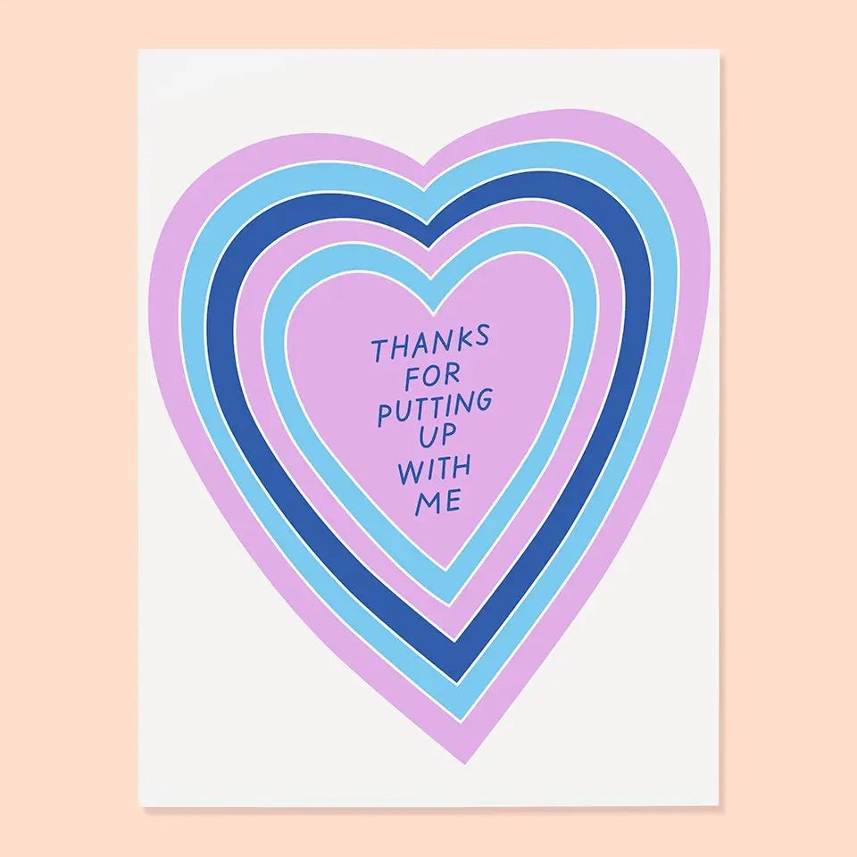 White greeting with blue and purple heart illustration. Blue text “thanks for putting up with me”