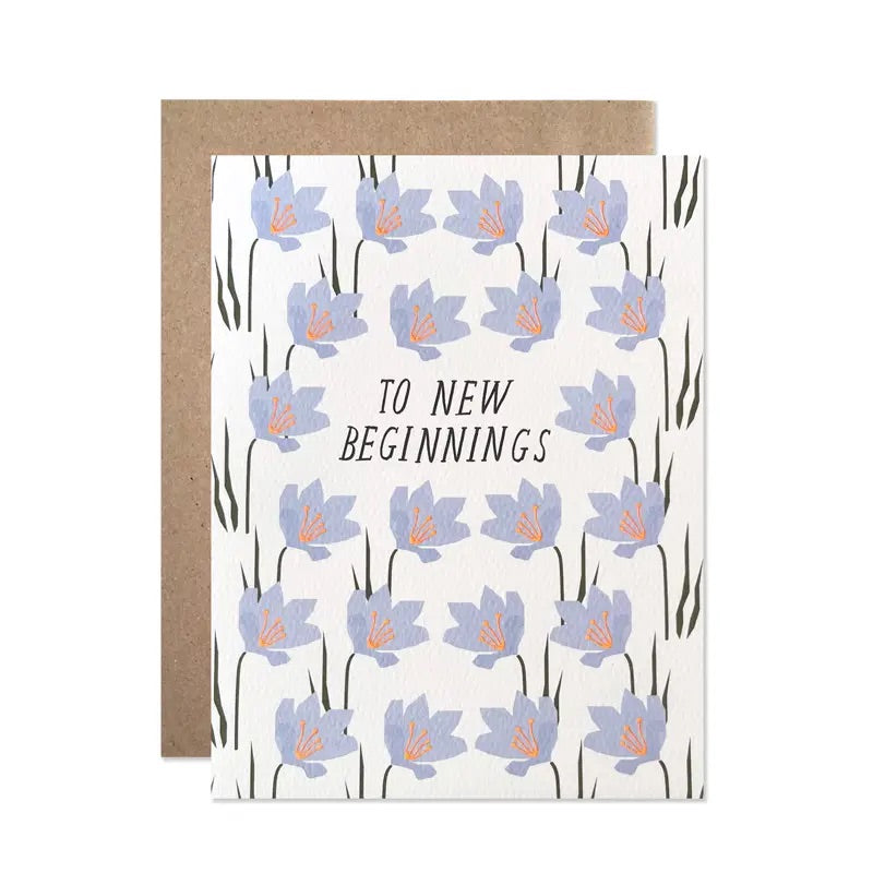 White card with light blue flowers. Black text "to new beginnings"