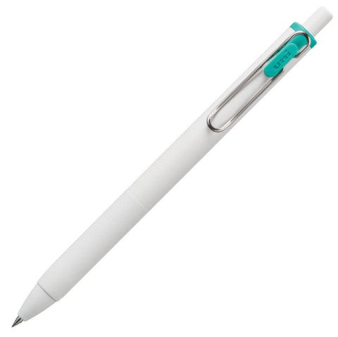 White pen barrel with silver clip. Emerald green detail near retractable cap.