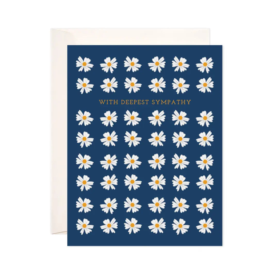 White card with a dark blue background and illustrations of white daisies. Yellow text reads "with deepest sympathy"