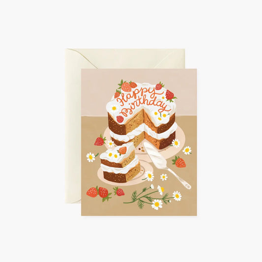 White birthday card with full color tan background. Illustration of a birthday cake and strawberries. Top of cake reads “happy birthday” in red lettering 