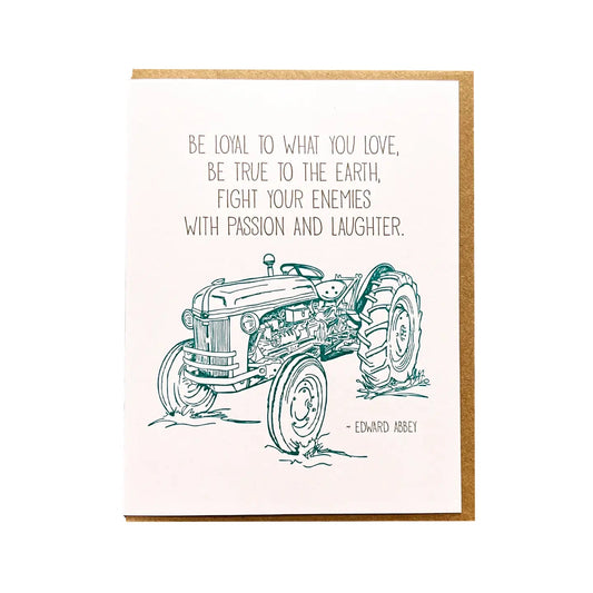 White card with a green illustration of a tractor. Black text. 