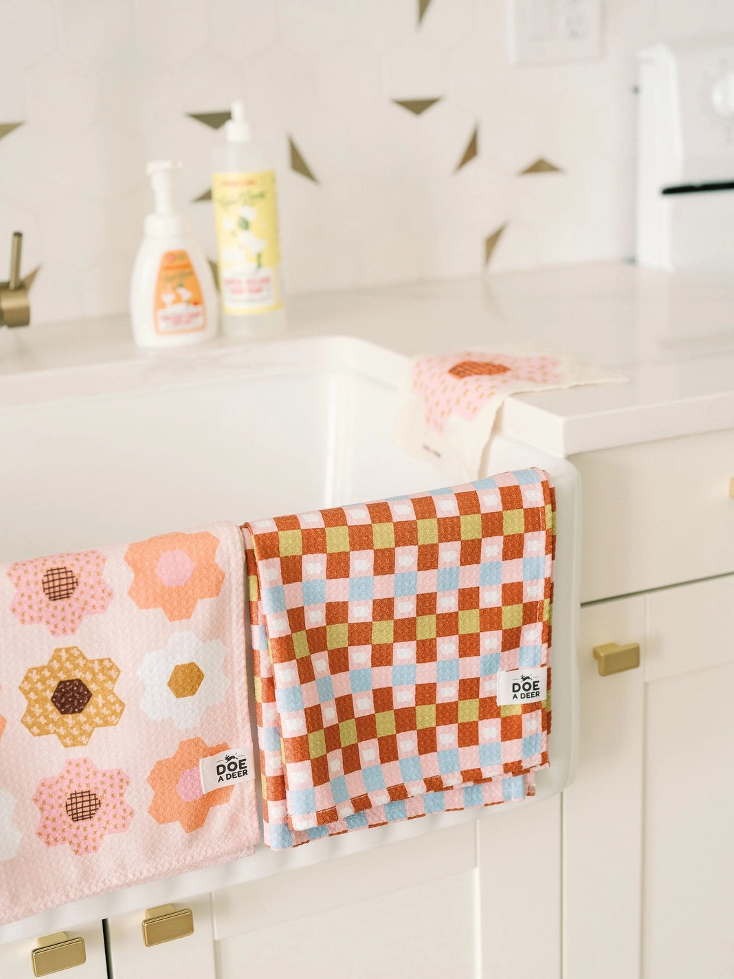 Kitchen with two microfiber towels hanging up 