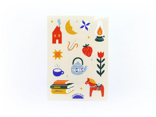 Sticker sheet showing 15 different colorful folk-art inspired stickers. 