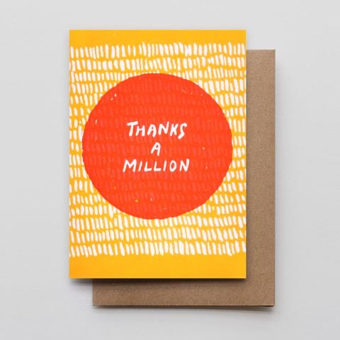 White card with full color yellow and white background. Red circle with white text inside “thanks a million” 