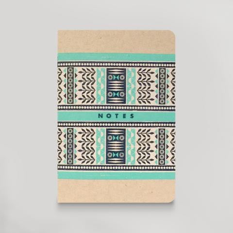 Front cover of notebook. Tan, light teal, and navy abstract design. "Notes" is in navy text. 