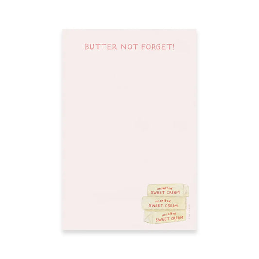 Rectangular white notepad. Pink text at the top "butter not forget" and an illustration of sticks of butter in the lower right corner. 