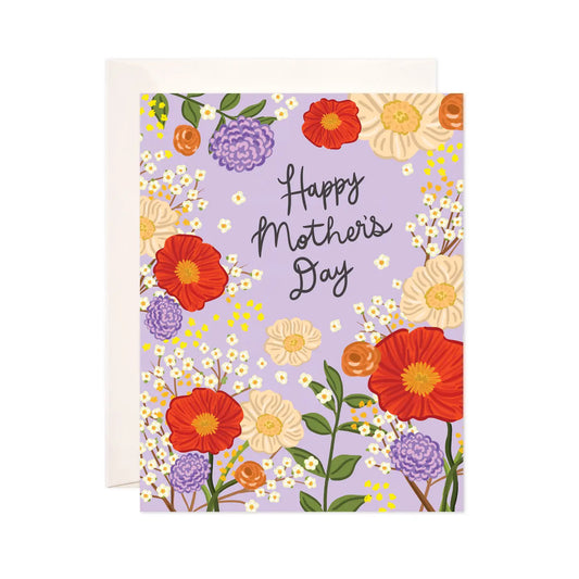 White greeting card with full color lilac background. Colorful floral illustrations. Black text “happy Mother’s Day” 