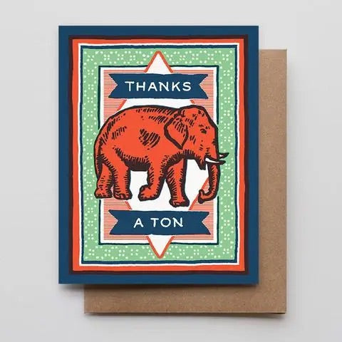 White card with navy, red, green, and white background. Illustration of a red elephant. White text on navy reading "thanks a ton" 