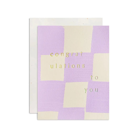 Hand-painted card with white and purple checkerboard. "congratulations to you" in gold text. 