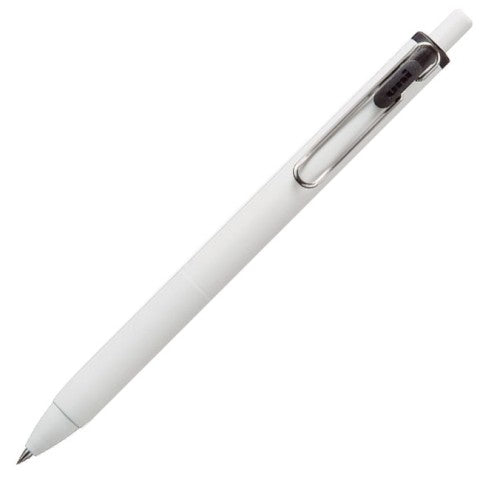 White pen barrel with silver clip. Black detail near retractable cap. 