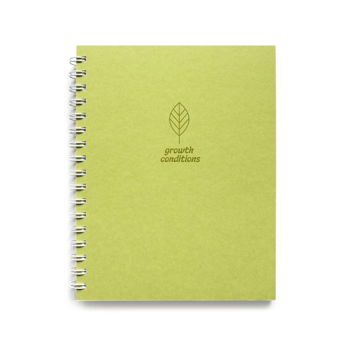 Front of a spiral bound lime green notebook. Text reads “growth conditions” 