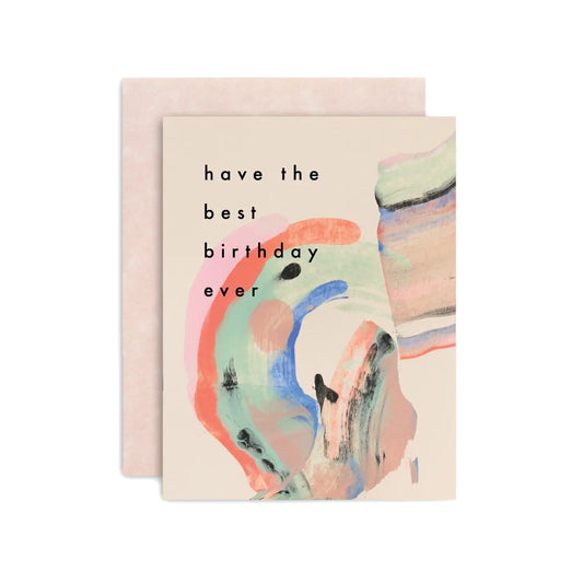 White card with pink, red, green and blue smeared paint design. Black text "have the best birthday ever" 