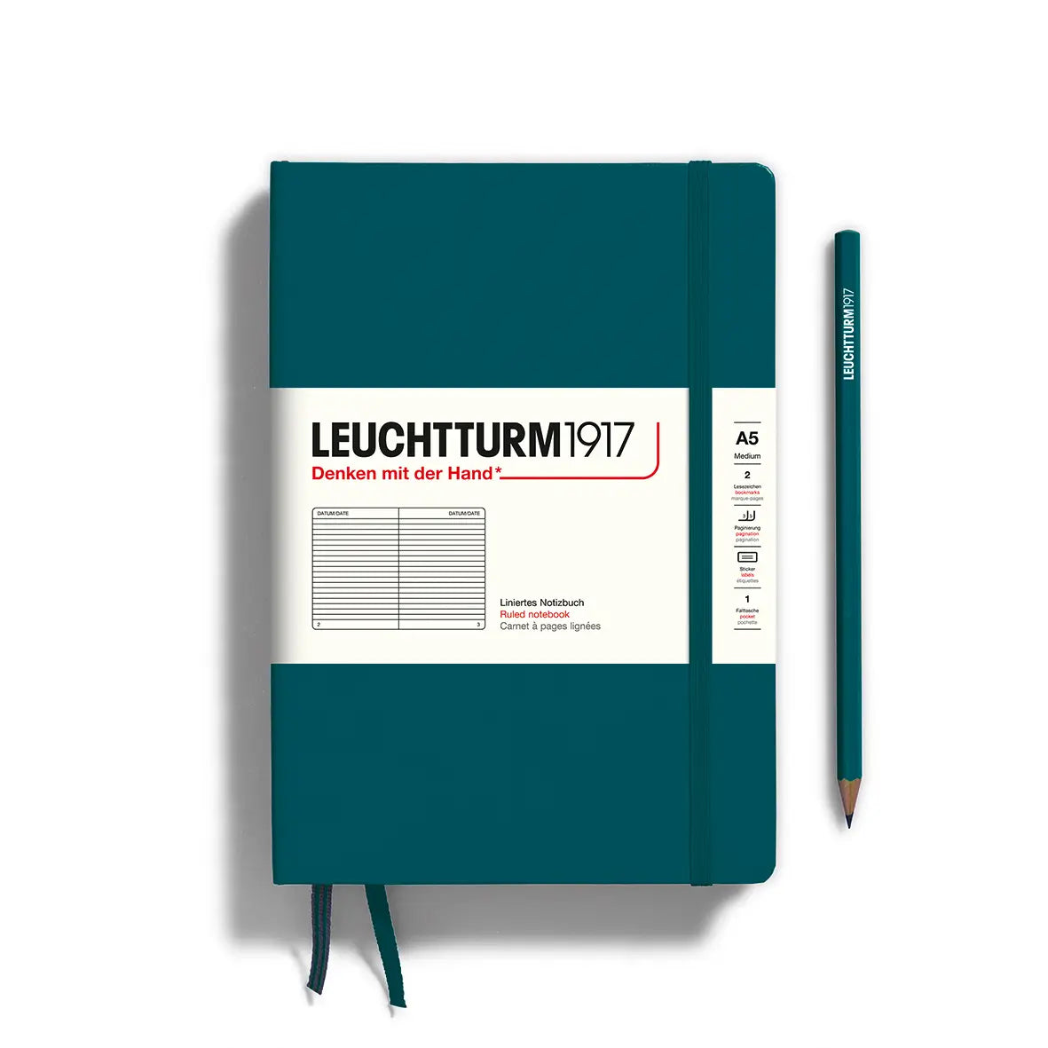 Notebook with jade green cover. White label with black text reading "leuctturm1917"