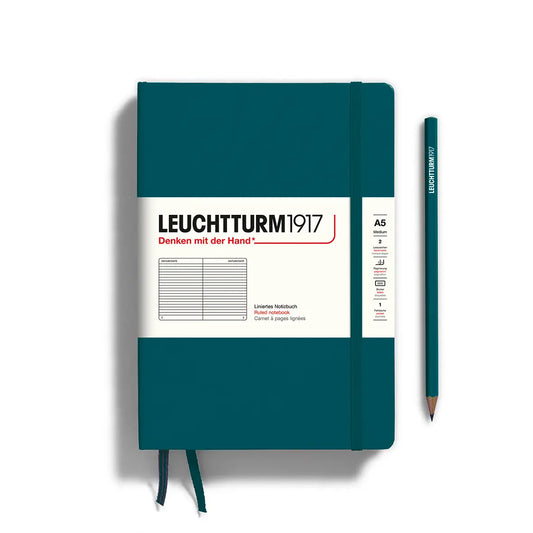 Notebook with jade green cover. White label with black text reading "leuctturm1917"