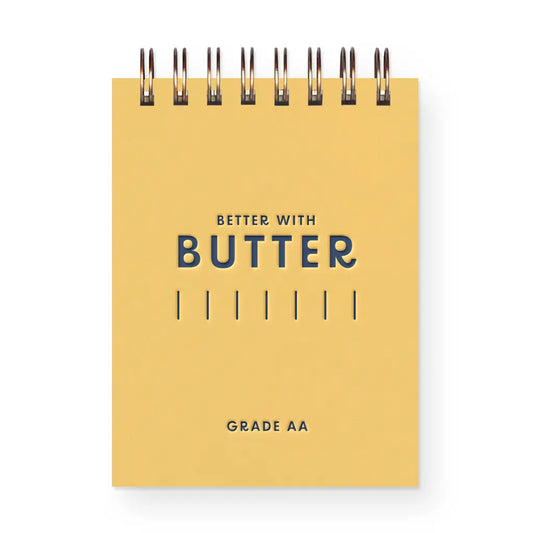 Yellow notebook with top spiral. 'Better with Butter' text on a white background