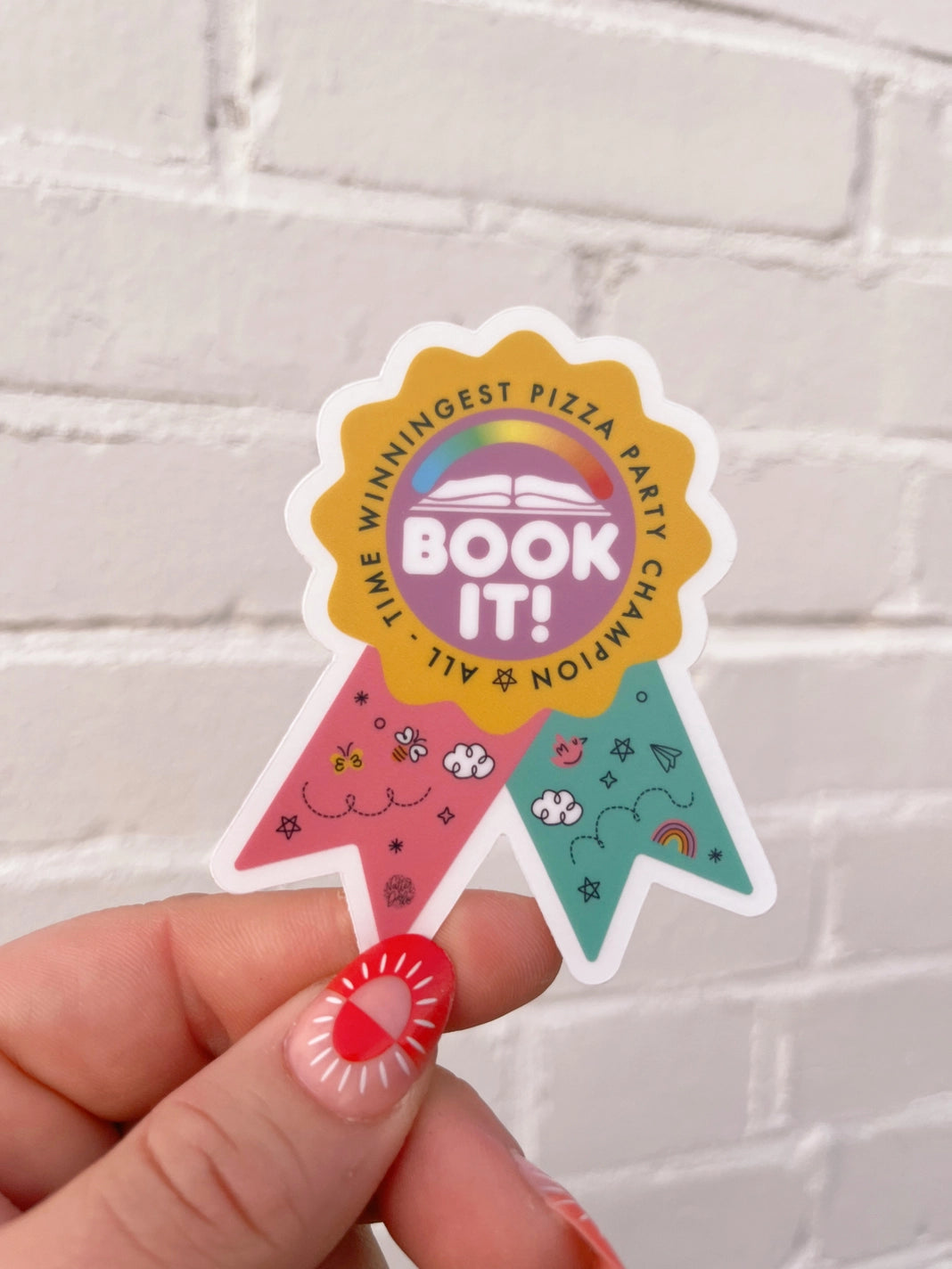 Die-cut sticker in the shape of a prize ribbon