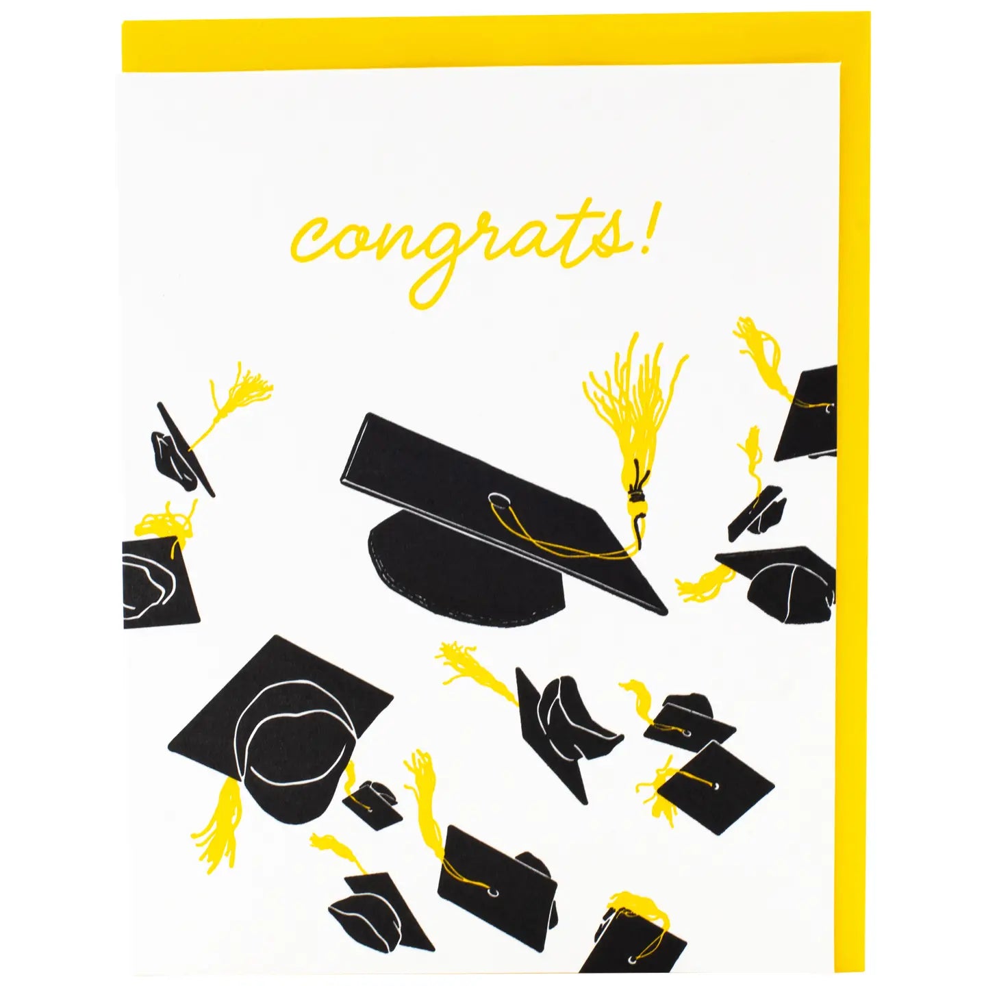 White greeting card with illustration of graduation caps tossed in the air. Yellow text: congrats! 