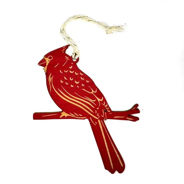 Red cardinal ornament hanging from bakers twine string