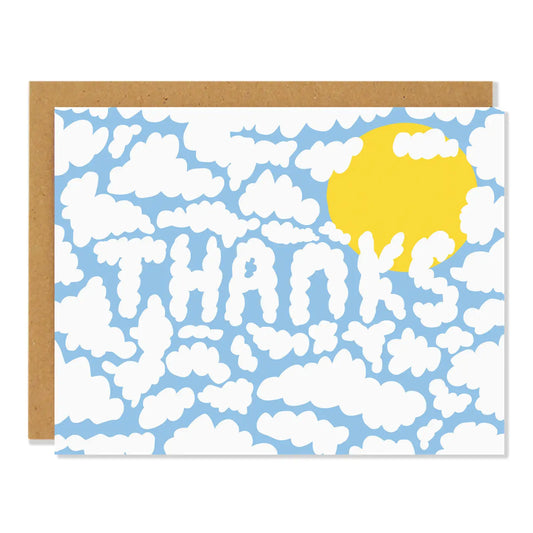 Card with blue sky and white clouds pattern and yellow sun, featuring the word 'THANKS' in clouds 