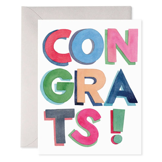 White greeting card with colorful 'CONGRATS!' text