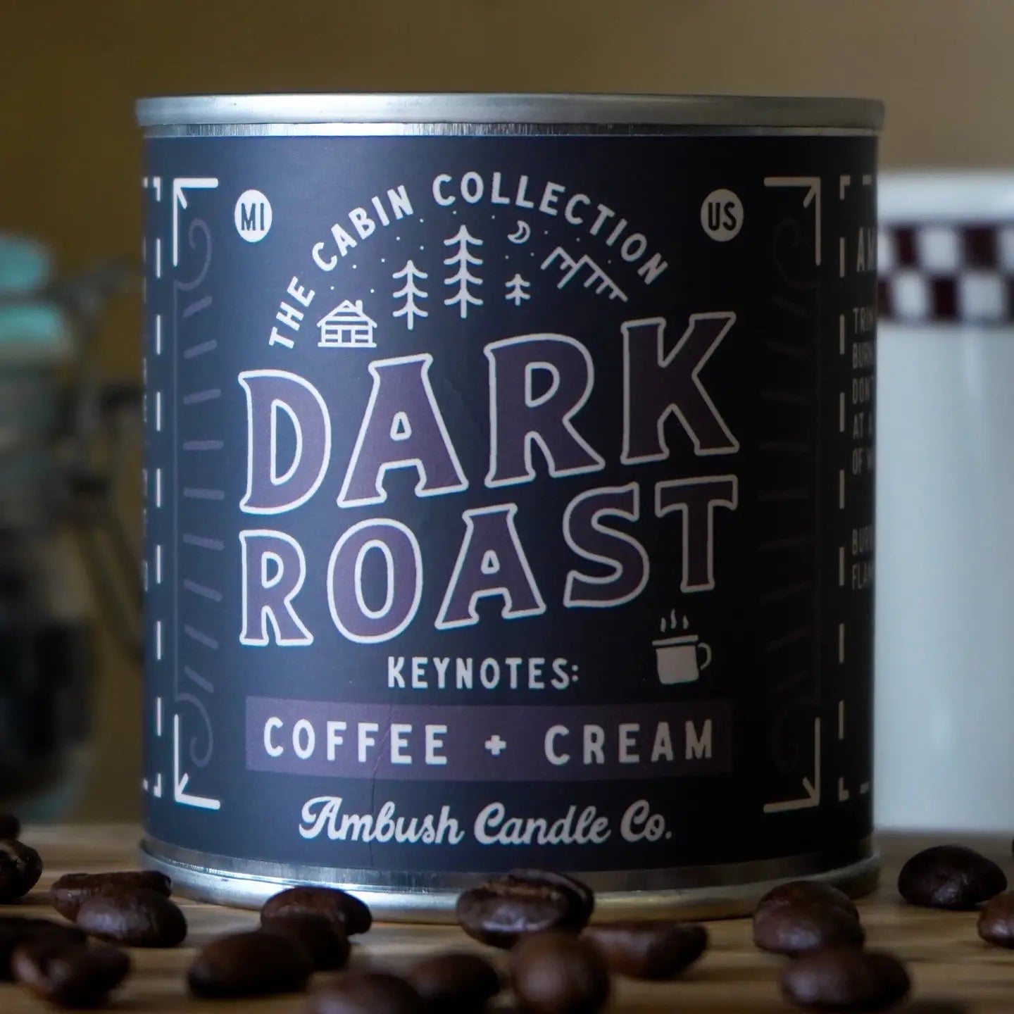 Candle can labeled 'Dark Roast' with coffee beans around it.