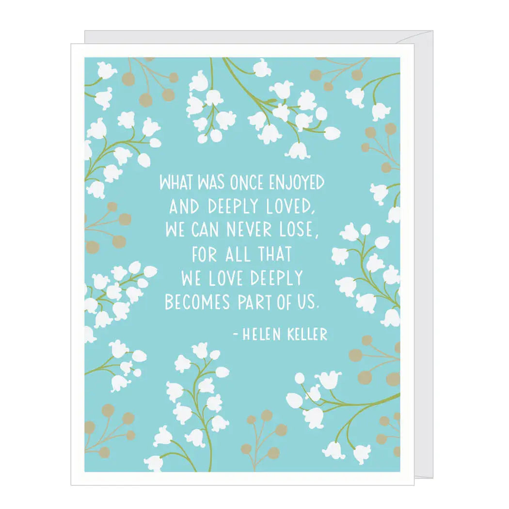 Card with a floral design and a quote by Helen Keller