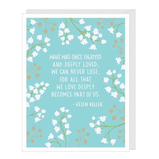 Card with a floral design and a quote by Helen Keller