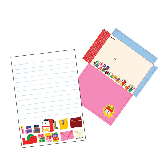 Letter writing set with a lined page with a stationery product bottom border and a colorful envelope 