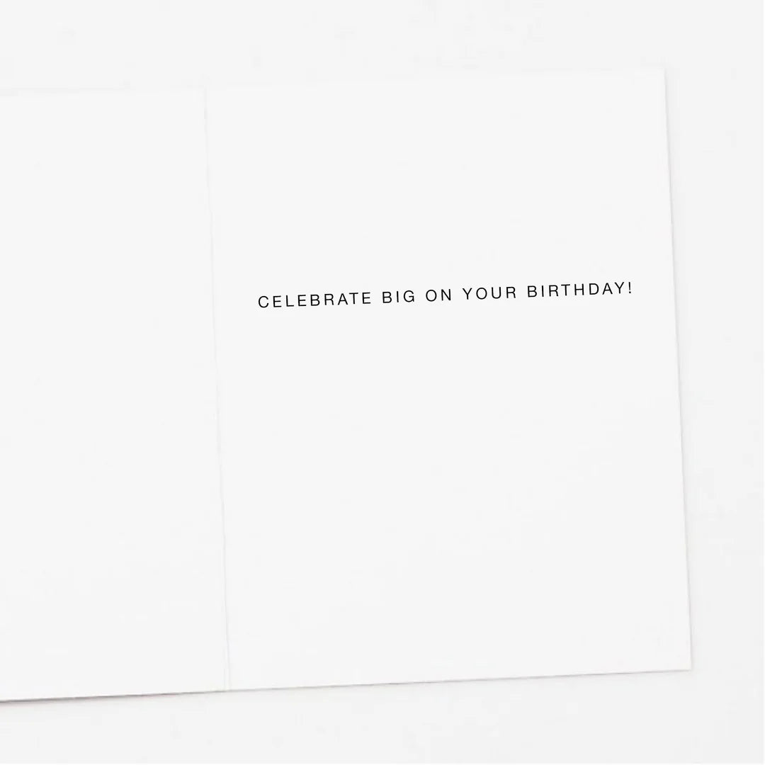 White card with black text 'Celebrate Big on Your Birthday!'
