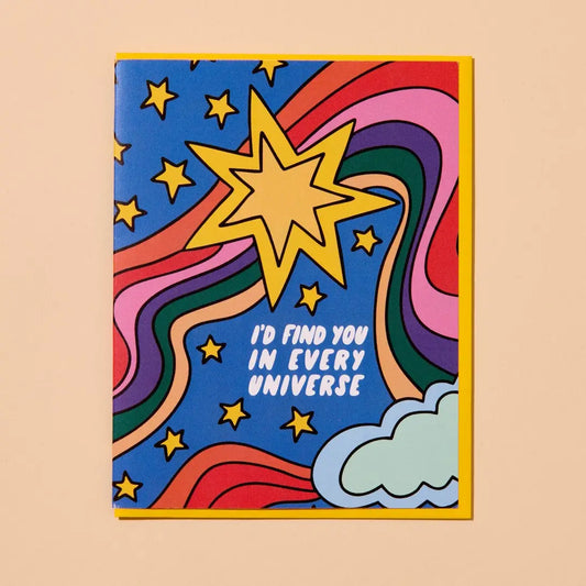 Greeting card with a colorful star design and text 'I'd find you in every universe' on a beige background