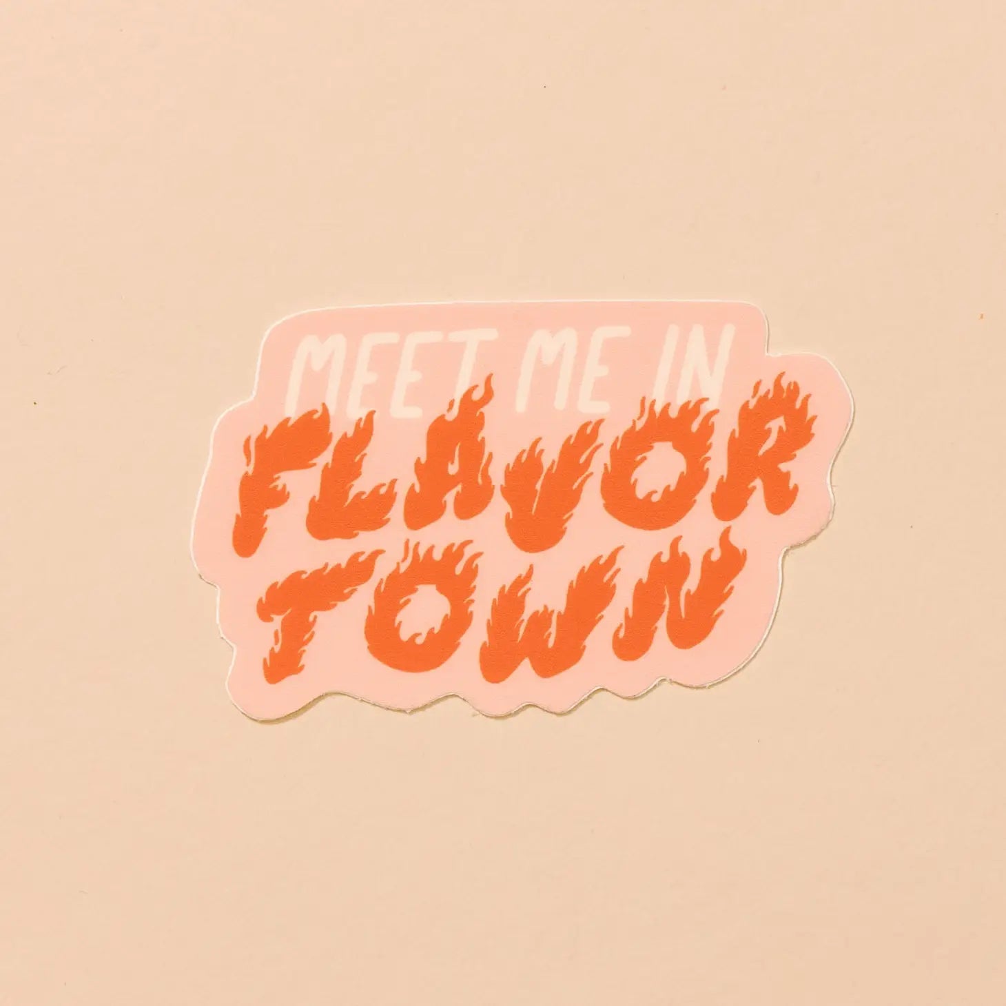 Die-cut orange sticker. White and orange text reads "meet me in flavor town." Flavor town is in orange flame font. 