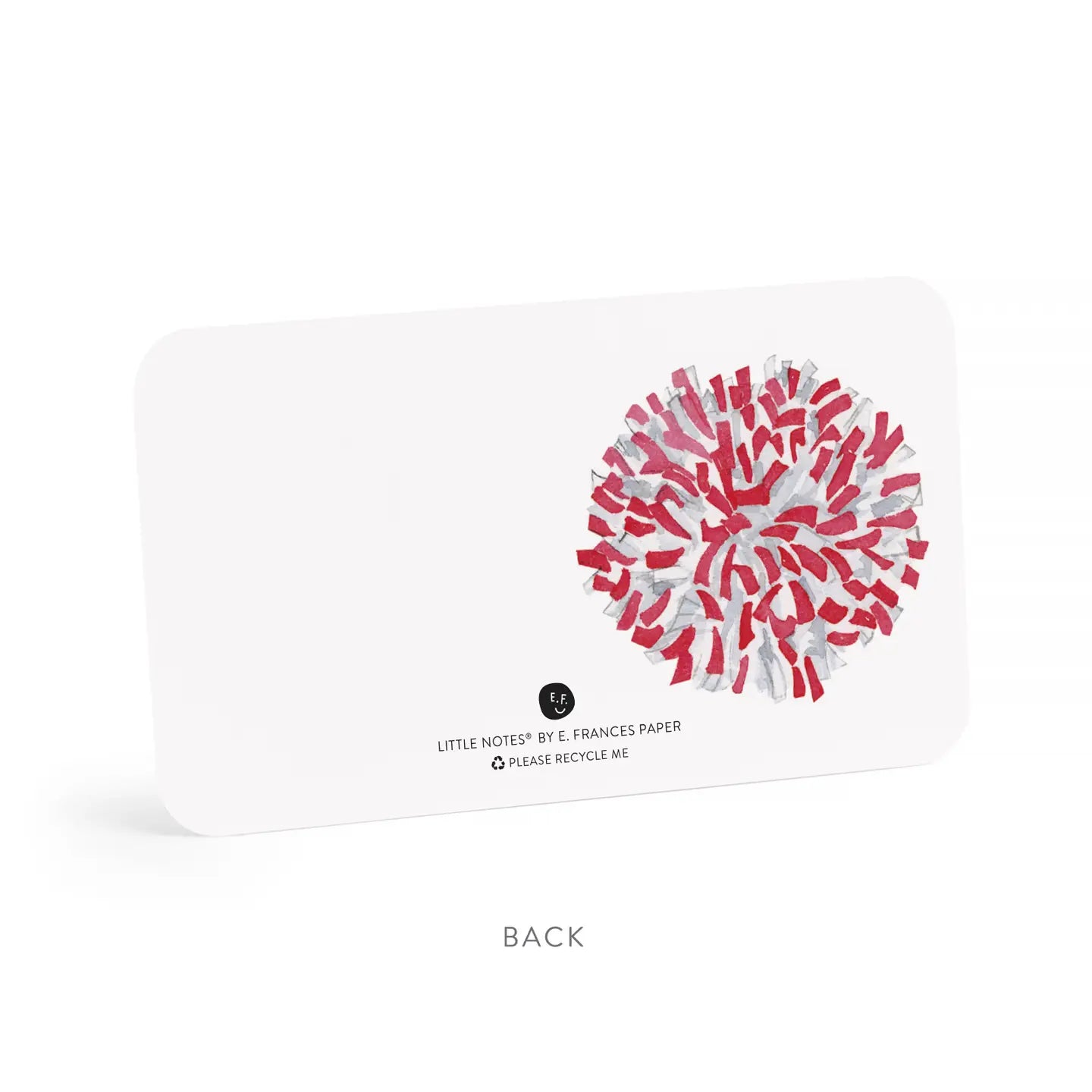 Back of white notecard with red and white pom pom design.