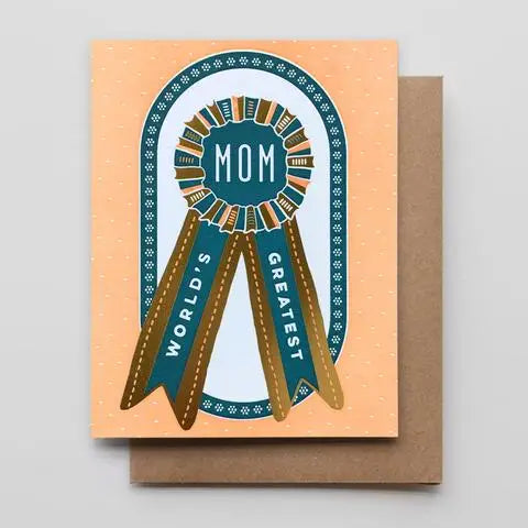 White card with yellow/orange background. Foil gold and blue ribbon. White text on ribbon reads "world's greatest mom"