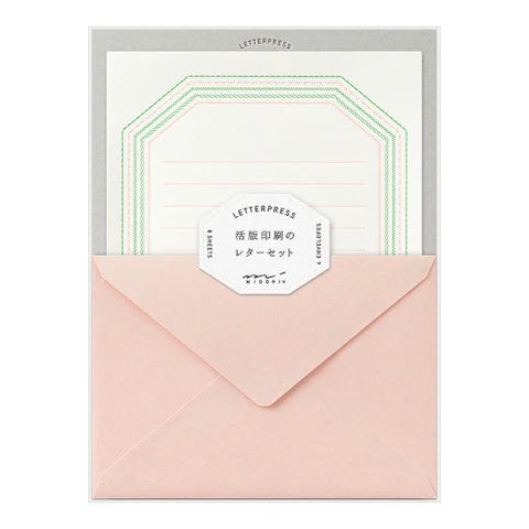 Letterpress stationery set with pink envelope and white paper 