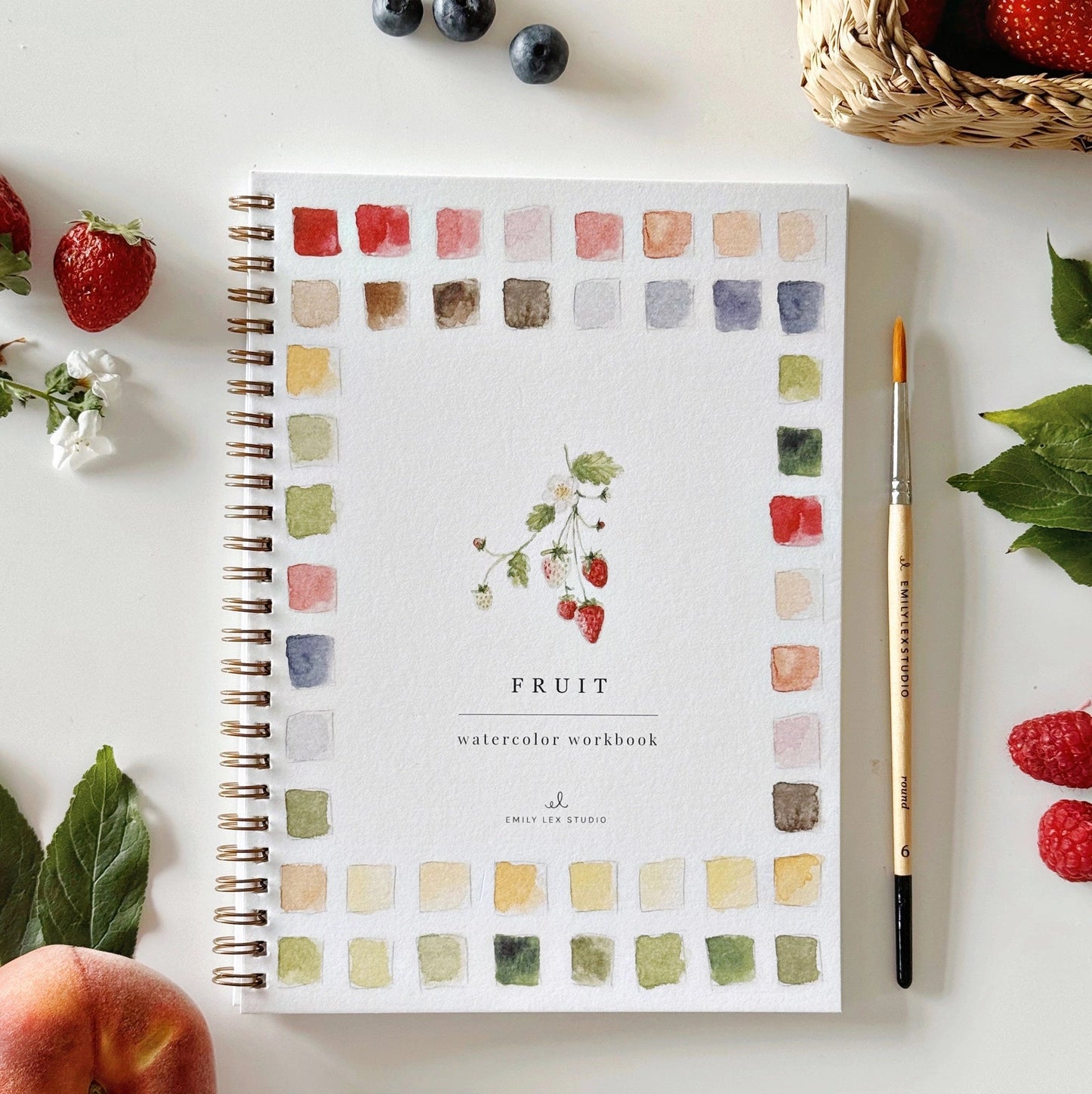 Watercolor workbook with fruit illustration 