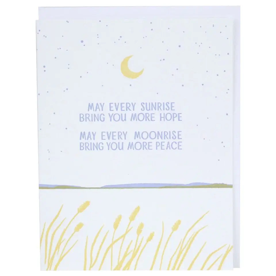 White greeting card with moon and horizon illustration and purple text.