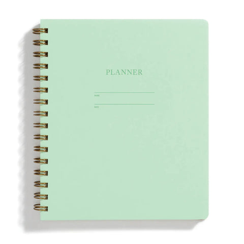 Mint planner cover. "Planner" is letterpress printed into the cover.