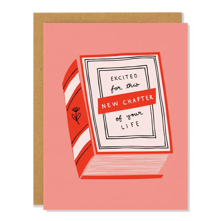 Peach card with an illustration of a red book. The cover of the book has black text reading "excited for this new chapter of your life." Inside of card is white.