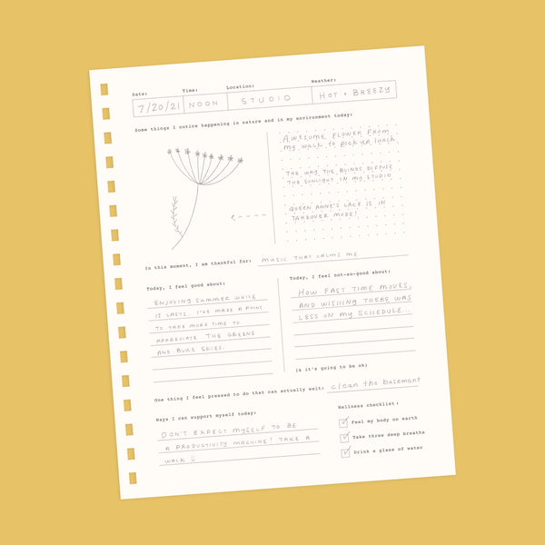 Inside view of notebook showing daily prompts