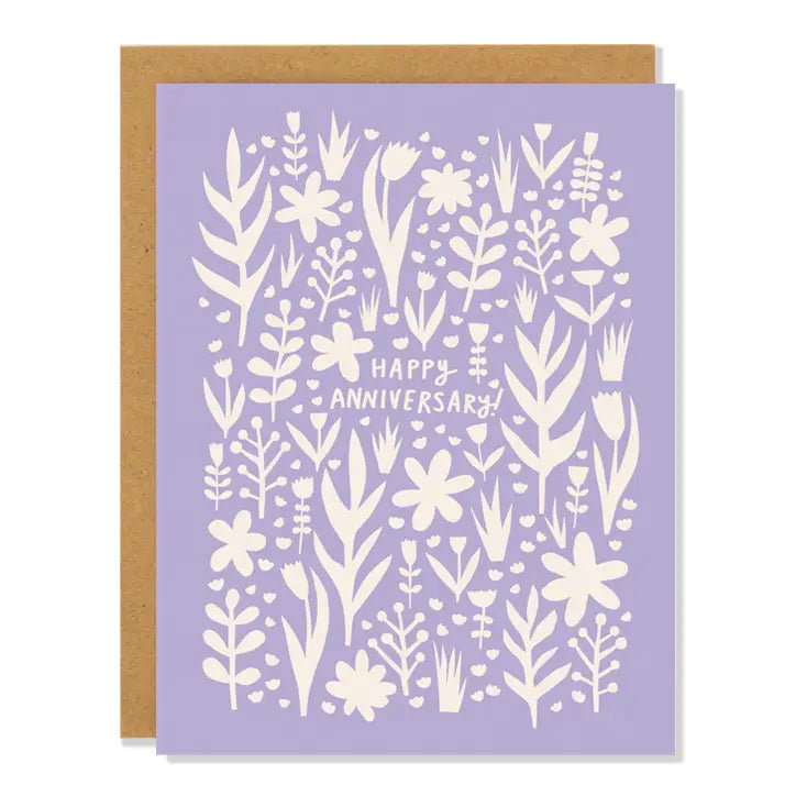 White greeting card with full color lavender background and white floral patterns. 'Happy Anniversary' text 