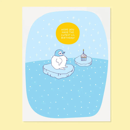Greeting card with a penguin on a blue background, featuring text 'hope you have the cutest lil' birthday!'.